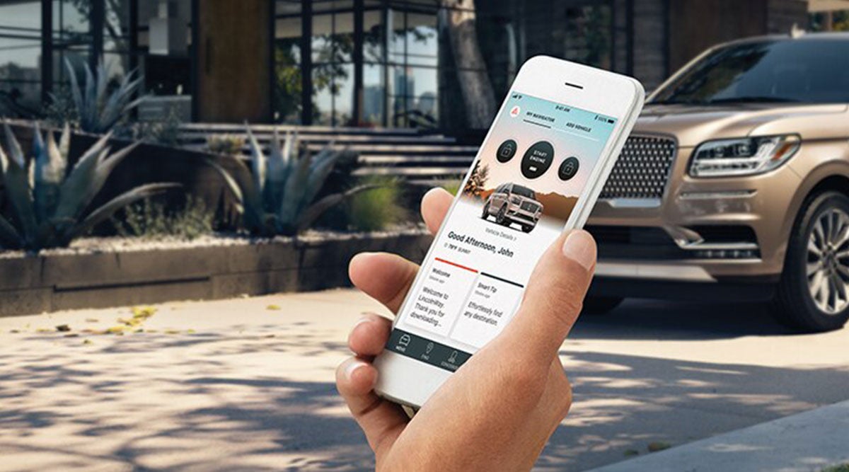 A person lookin on a mobile phone with the WayTM App