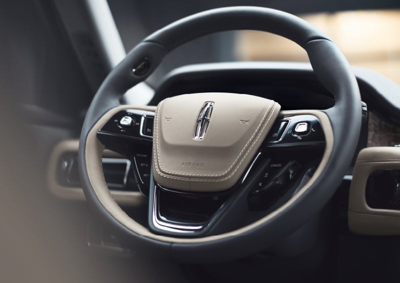 The intuitively placed controls of the steering wheel on a 2024 Lincoln Aviator® SUV | Nick Mayer Lincoln Westlake in Westlake OH