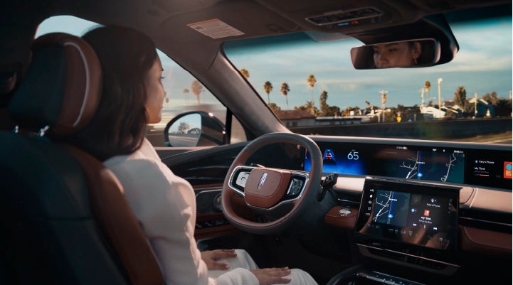 A person is shown driving hands-free on the highway with available Lincoln BlueCruise technology. | Nick Mayer Lincoln Westlake in Westlake OH