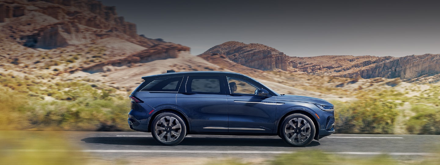 A 2024 Lincoln Nautilus® SUV is being driven in a desert setting. | Nick Mayer Lincoln Westlake in Westlake OH