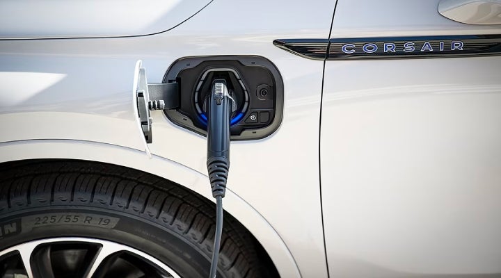 An electric charger is shown plugged into the charging port of a Lincoln Corsair® Grand Touring
model. | Nick Mayer Lincoln Westlake in Westlake OH