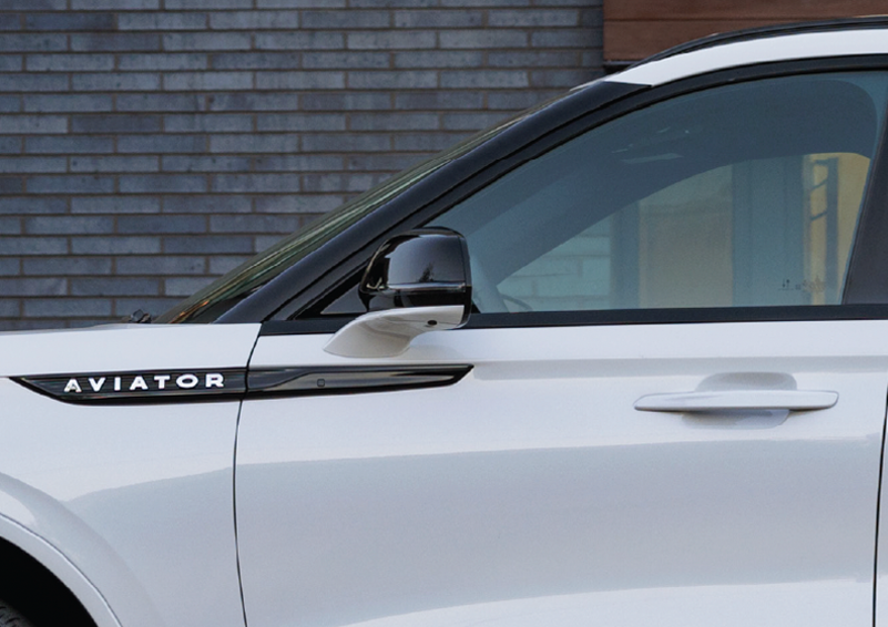 The driver’s door of a white 2025 Lincoln Aviator® SUV is showcased. | Nick Mayer Lincoln Westlake in Westlake OH