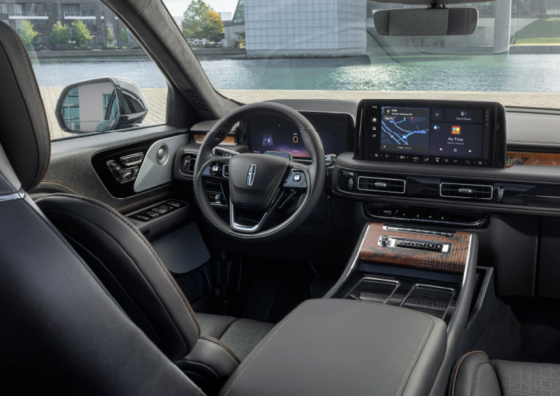 The interior of the 2025 Lincoln Aviator® SUV is shown parked with a view of a harbor through the windshield. | Nick Mayer Lincoln Westlake in Westlake OH