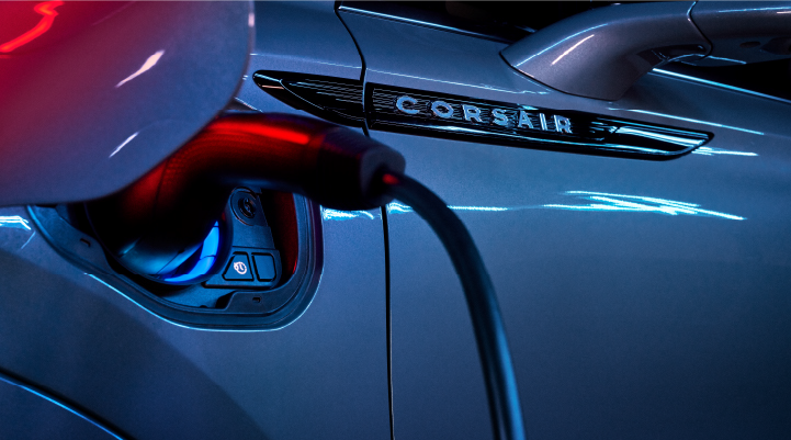 A charger plugged into the charging port of a 2025 Lincoln Corsair® Plug-in Hybrid model. | Nick Mayer Lincoln Westlake in Westlake OH