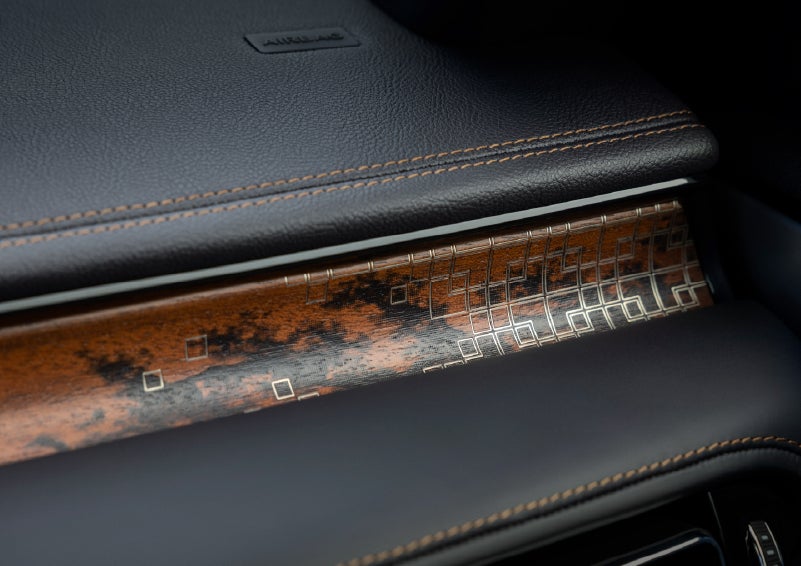A close-up shot of the 2026 Lincoln Aviator® dashboard with unique black and brown accents and brown stitching. | Nick Mayer Lincoln Westlake in Westlake OH