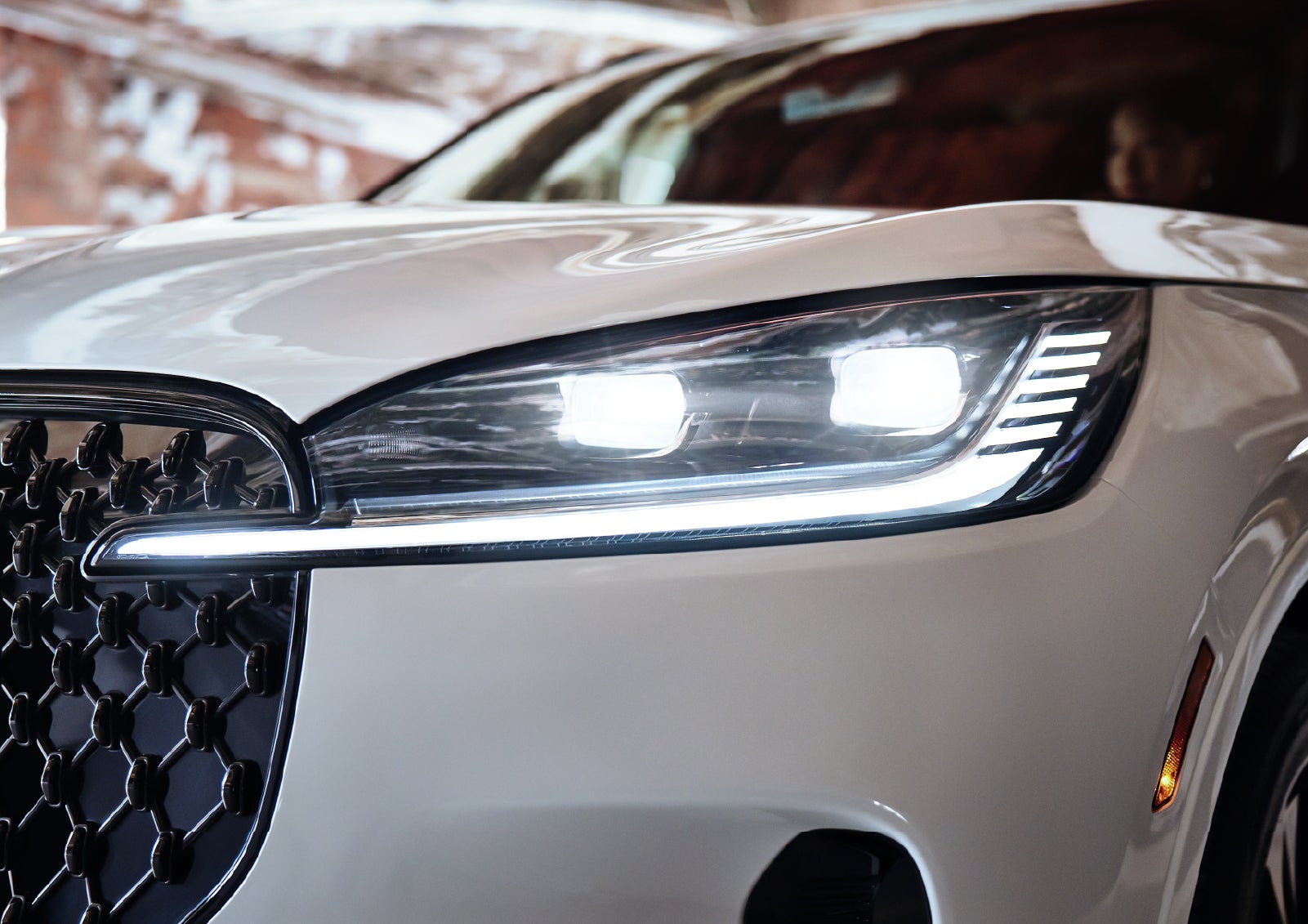 A close-up of a headlamp on the 2027 Lincoln Aviator® SUV is shown. | Nick Mayer Lincoln Westlake in Westlake OH