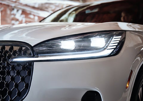 A close-up of a headlamp on the 2027 Lincoln Aviator® SUV is shown. | Nick Mayer Lincoln Westlake in Westlake OH