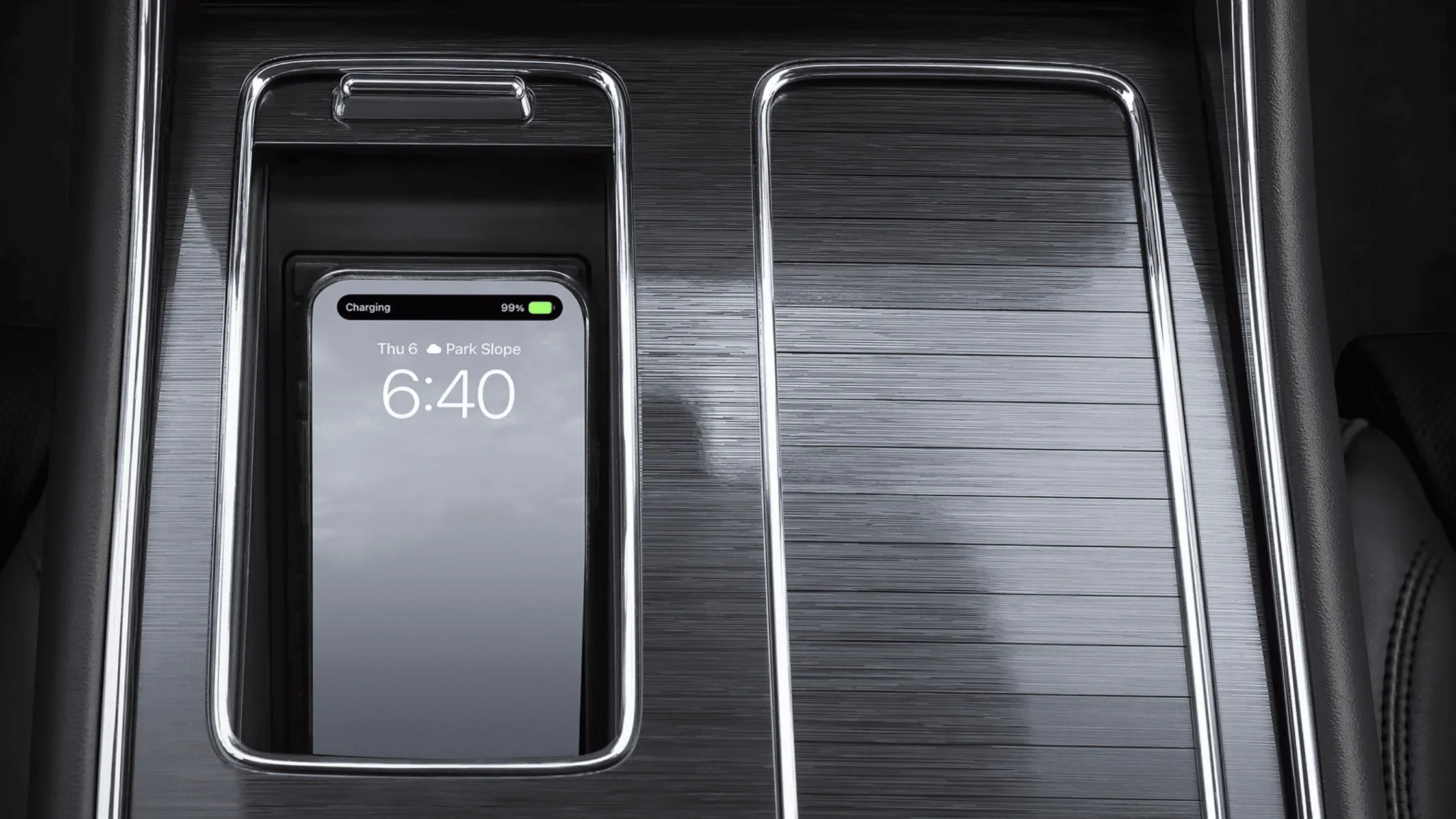 Close-up of 2025 Lincoln Aviator® Premiere center console with wireless charging phone dock