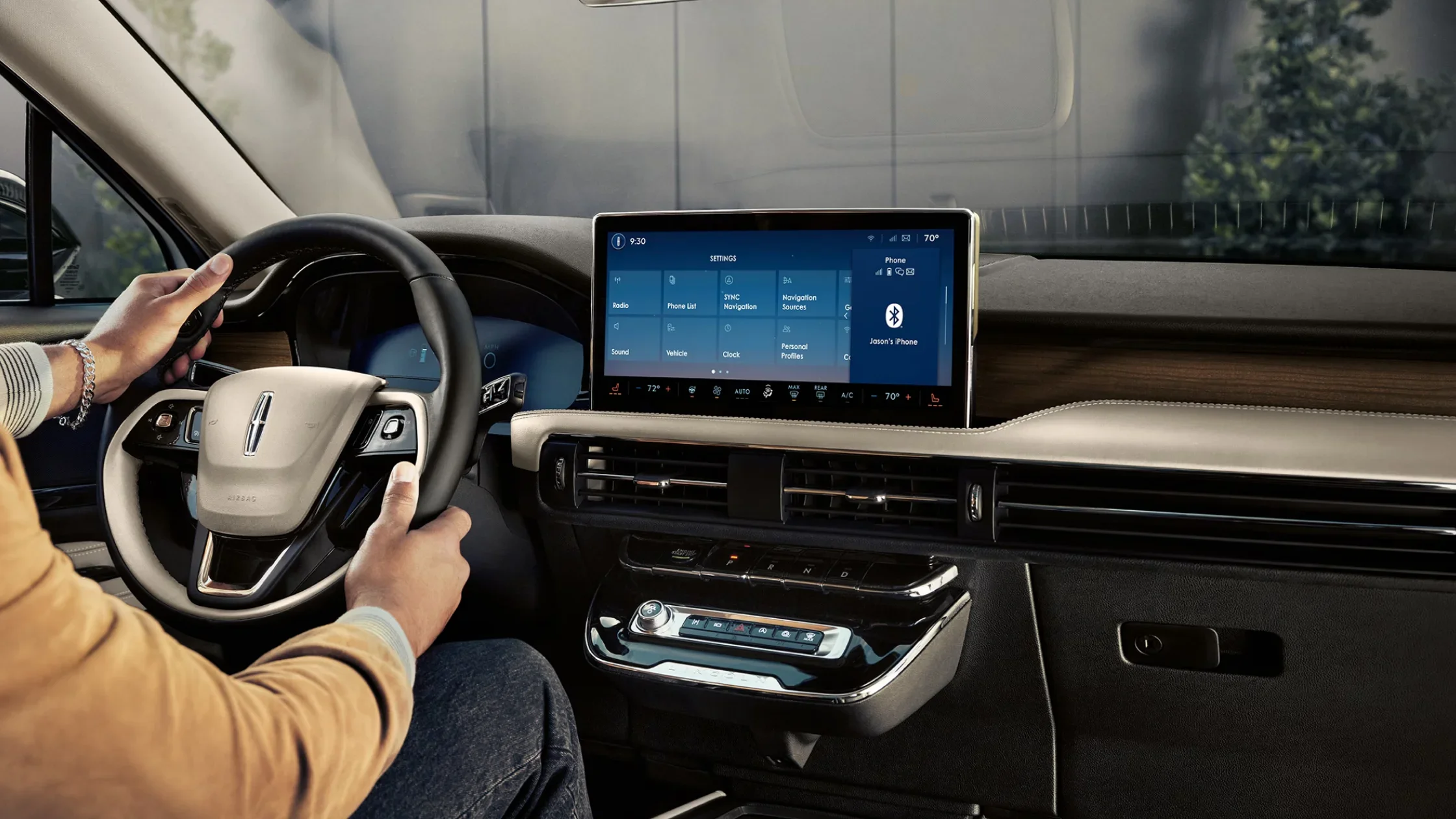 Interior of the 2025 Lincoln Corsair® Premiere featuring a digital cockpit and touchscreen display.
