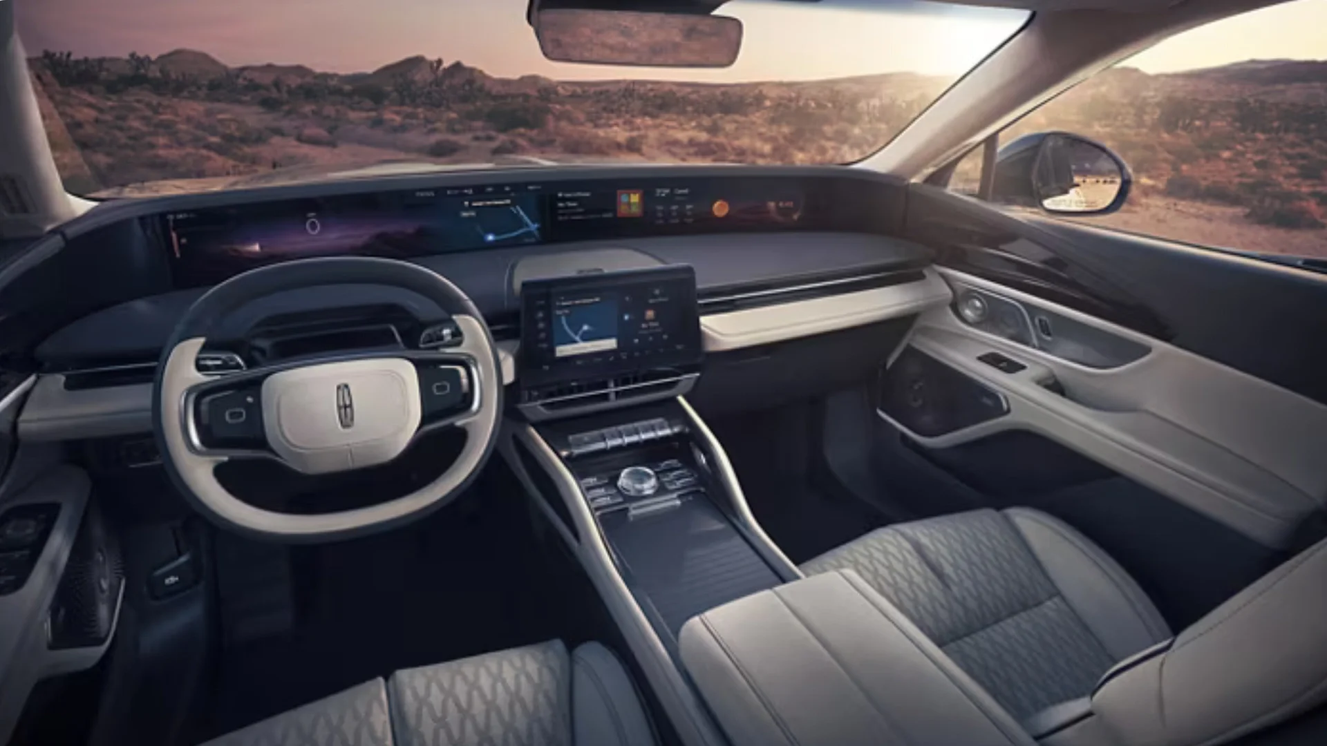 Interior cockpit of a 2025 Black Label Nautilus® featuring a wide digital display and two-tone leather accents.