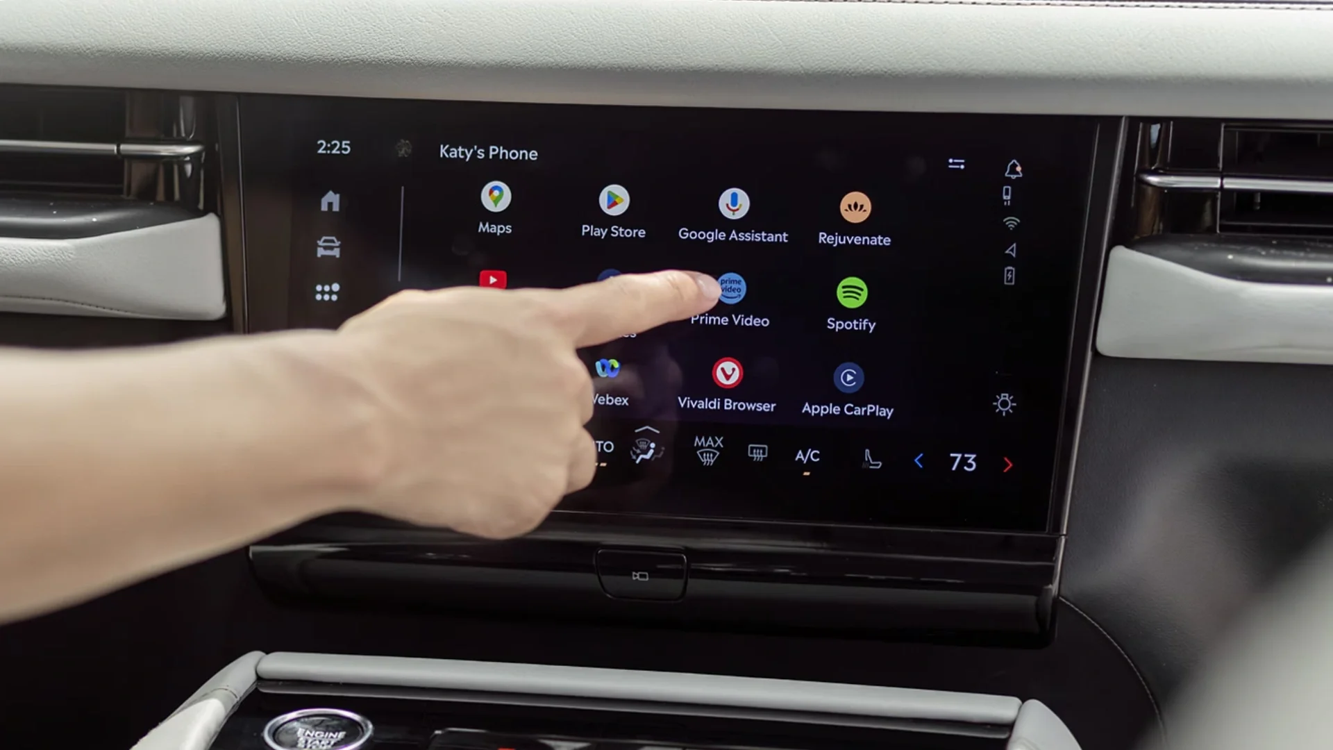 Close-up of the 2025 Lincoln Navigator Reserve infotainment system with touchscreen displaying modern apps like Google Assistant, Spotify, and Prime Video for connected driving convenience.