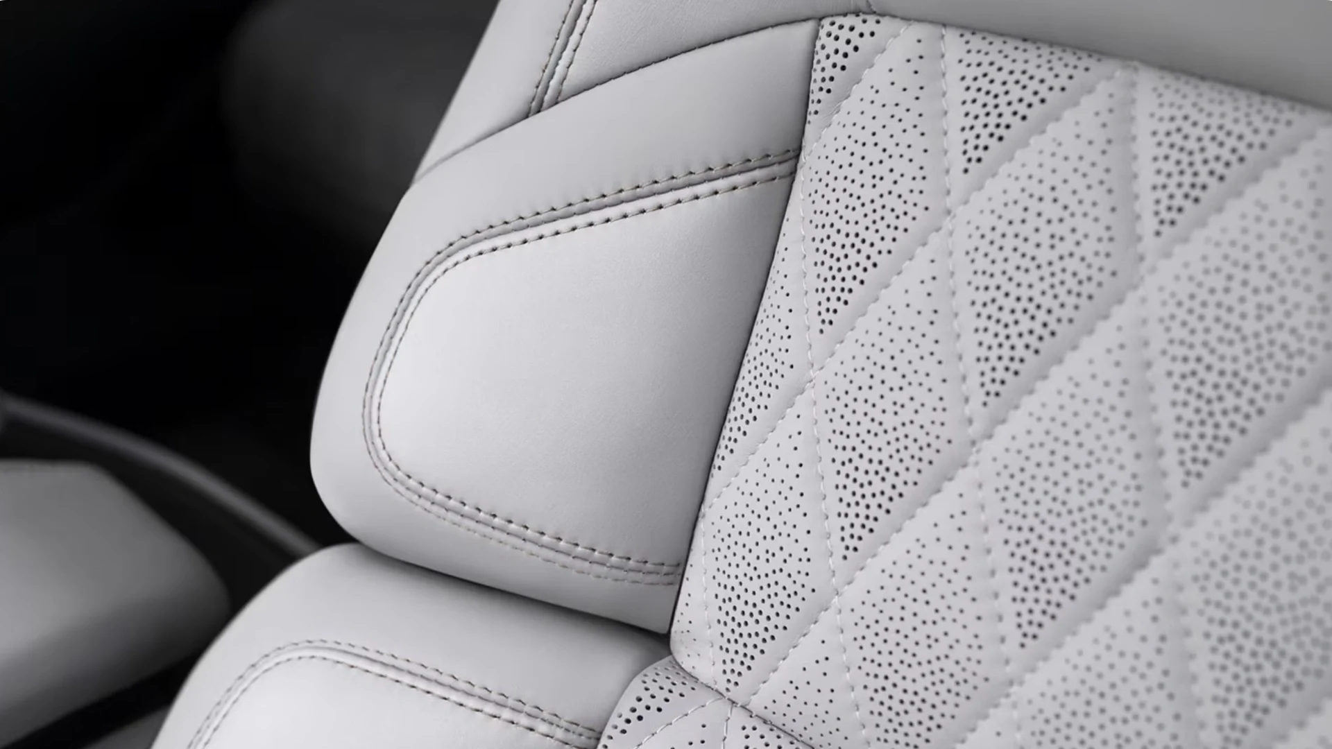 Perforated leather seat stitching detail inside the 2025 Lincoln Navigator Black Label interior.